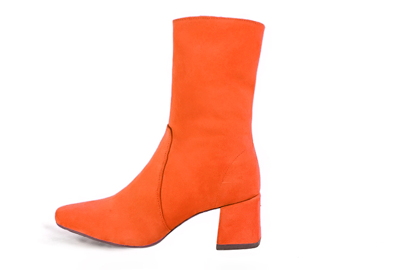 Clementine orange women's ankle boots with a zip on the inside. Square toe. Medium block heels. Profile view - Florence KOOIJMAN